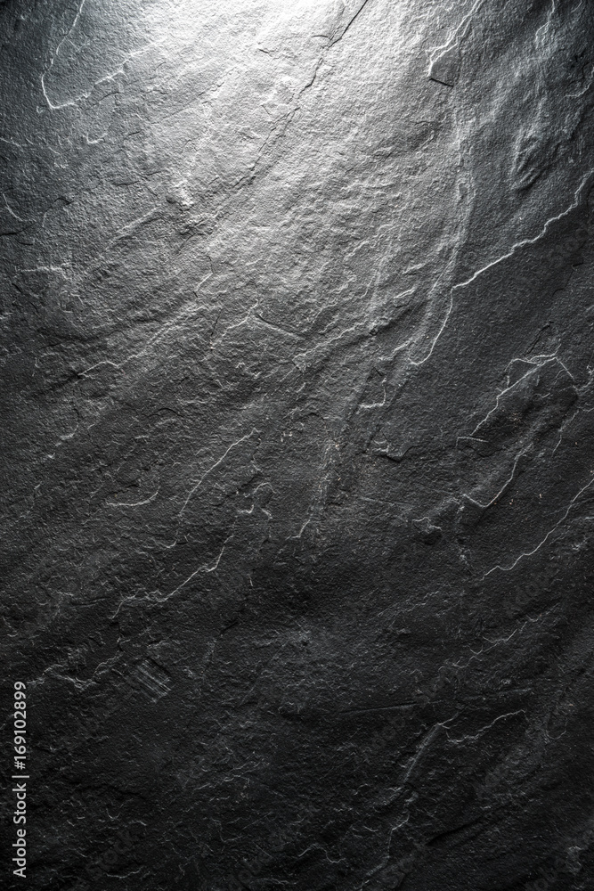 Fototapeta premium Background of a piece of black stone