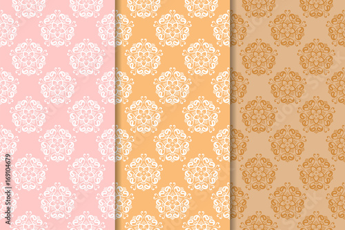 Set of orange floral ornaments. Vertical seamless patterns