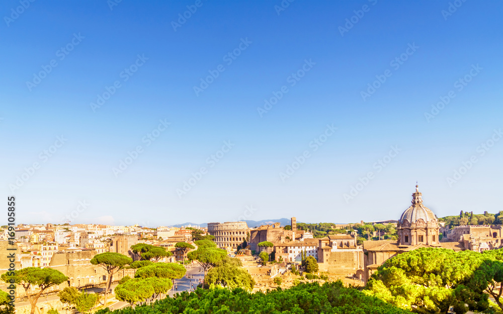Rome cityscape with forum Romano and Colosseum.