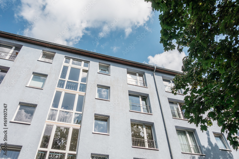 apartment building with four floors in low angle view apartment building with four floors in low angle view