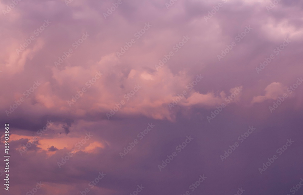 Pink shade on dark thunderclouds