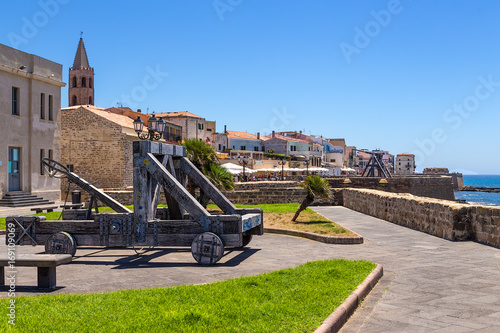 Alghero, Sardinia, Italy. An old catapult on the embankment in the old town photo