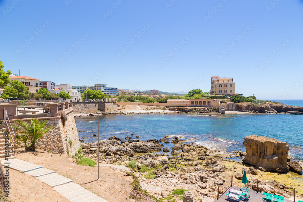 Alghero, Sardinia, Italy. Scenic landscape with medieval bastions on the beach