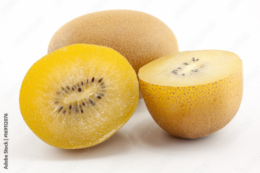 Fototapeta premium SunGold kiwi fruit slices on white background