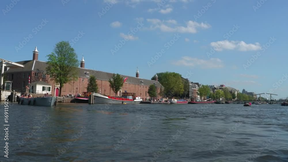 Boat tour on Amstel River with famous bridge called Magere Brug Boat tour on Amstel River with famous bridge called Magere Brug