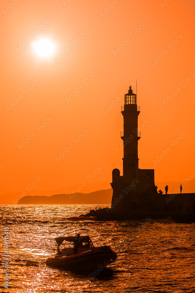 Picture of lighthouse sihoulette in the sunset
