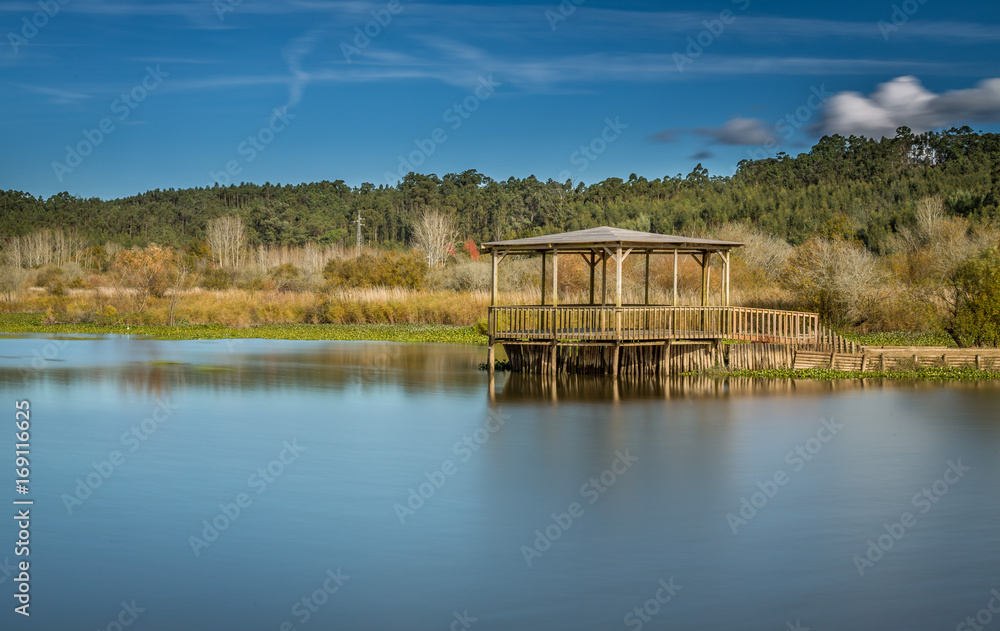 Landscape and Autumn exposure in a wooden deck done in Pateira de Fermentelos, portugal