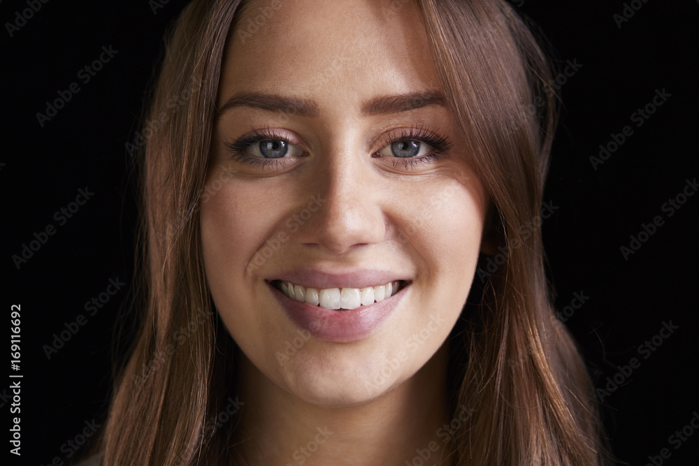 Close Up Head And Shoulders Studio Portrait Of Smiling Woman Close Up Head And Shoulders Studio Portrait Of Smiling Woman