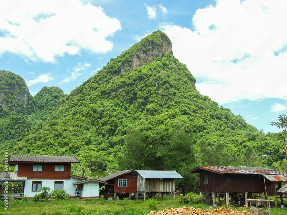 mountain and thai style house at Phatthalung Thailand
