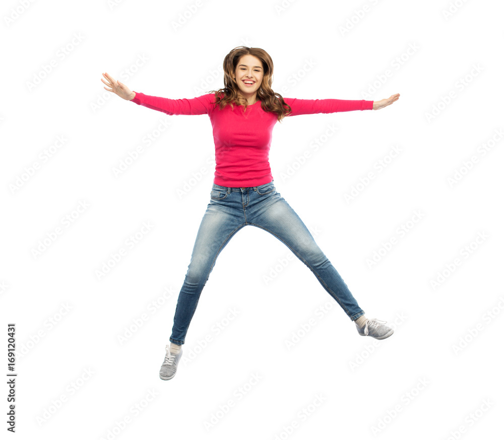 smiling young woman jumping in air