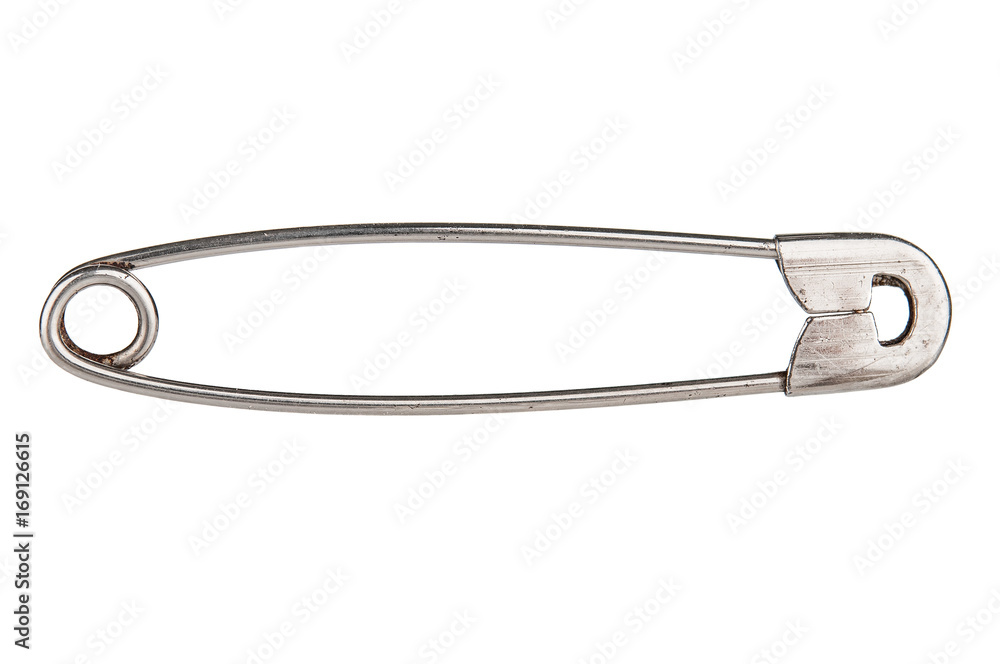 Old dirty safety pin on white background Old dirty safety pin on white background