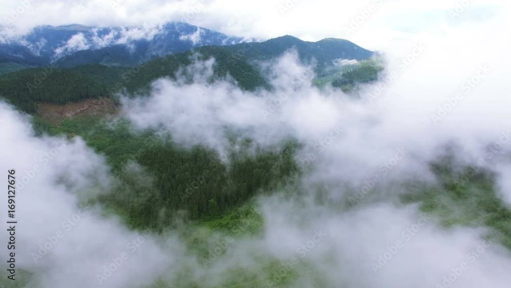 4K .Aerial. Flight in mountains like bird through clouds. 4K .Aerial. Flight in mountains like bird through clouds.