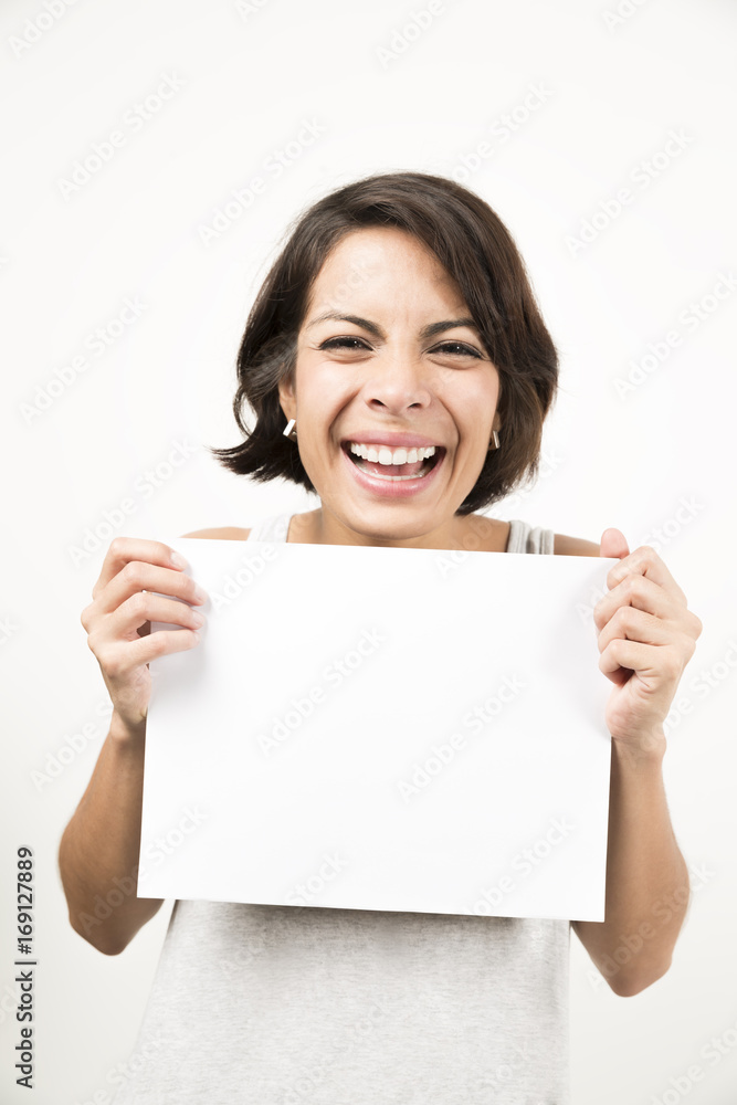 Beautiful young woman holding a blank sheet of paper Beautiful young woman holding a blank sheet of paper