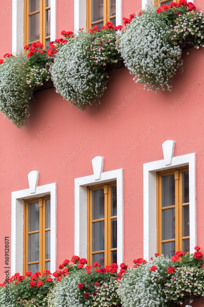 Karlovy Vary, Czech Republic - August 15, 2017:old condominiums flanked by the streets of the city, with a row of windows Karlovy Vary, Czech Republic - August 15, 2017:old condominiums flanked by the streets of the city, with a row of windows