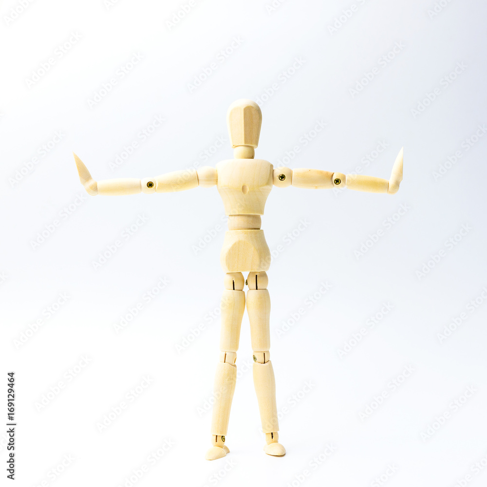 Wooden figure doll with extend the arms emotion for exercise concept on white background Wooden figure doll with extend the arms emotion for exercise concept on white background