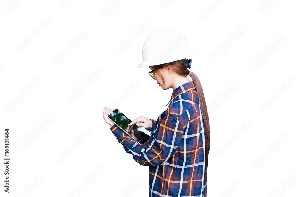 Young Asian engineer or architect woman wearing safety helmet and safety glasses use tablet on white background with clipping path for construction concept Young Asian engineer or architect woman wearing safety helmet and safety glasses use tablet on white background with clipping path for construction concept