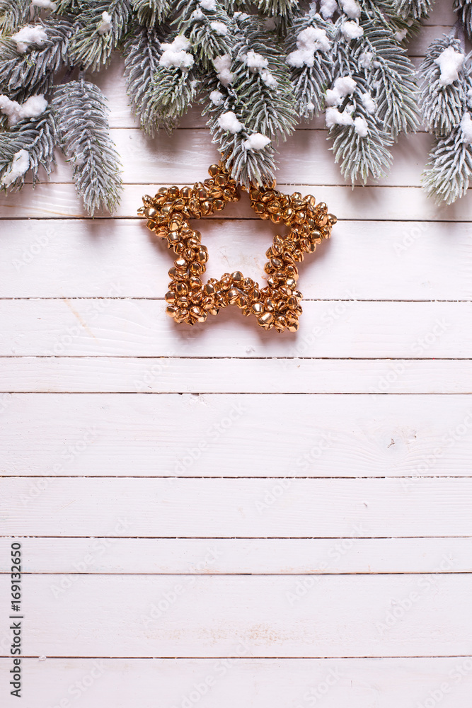 Christmas star and branches fur tree on wooden background. Christmas star and branches fur tree on wooden background.