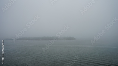 Small islands near Helsinki in the fog