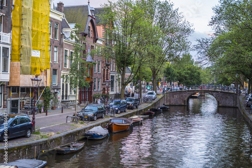 The beautiful city of Amsterdam with its canals and small houses © 4kclips