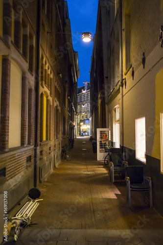 A narrow lane in Amsterdam - evening view - AMSTERDAM - THE NETHERLANDS - JULY 20  2017