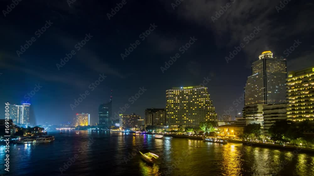 Night timelapse of Chao Phraya river with modern hotels in Bangkok, Thailand Night timelapse of Chao Phraya river with modern hotels in Bangkok, Thailand