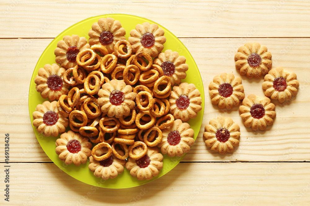 Biscuit in the plate on wood background Biscuit in the plate on wood background