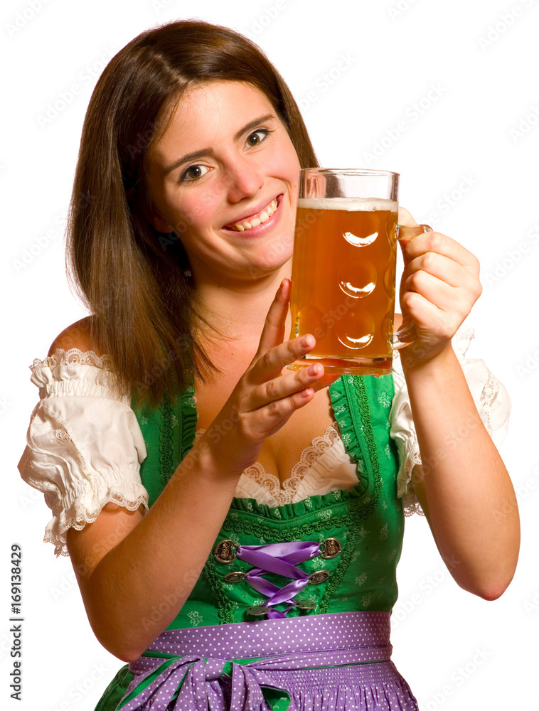 Attraktive junge Frau im Dirndl mit Bierkrug
