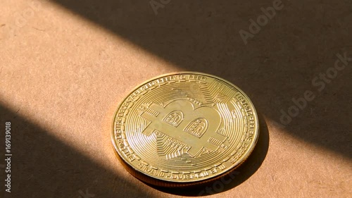 Golden Bitcoin сoin turns