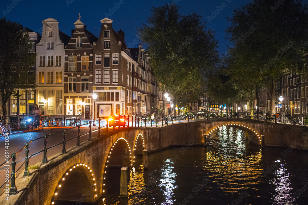 Fototapeta premium Amsterdam by night - wonderful view in the city center