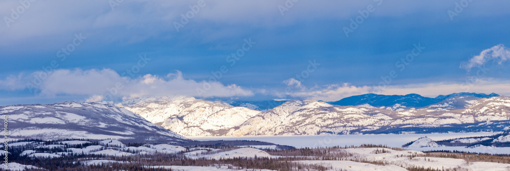 Winter taiga frozen Lake Laberge Yukon T Canada