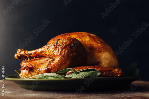 Roasted turkey on a platter photo
