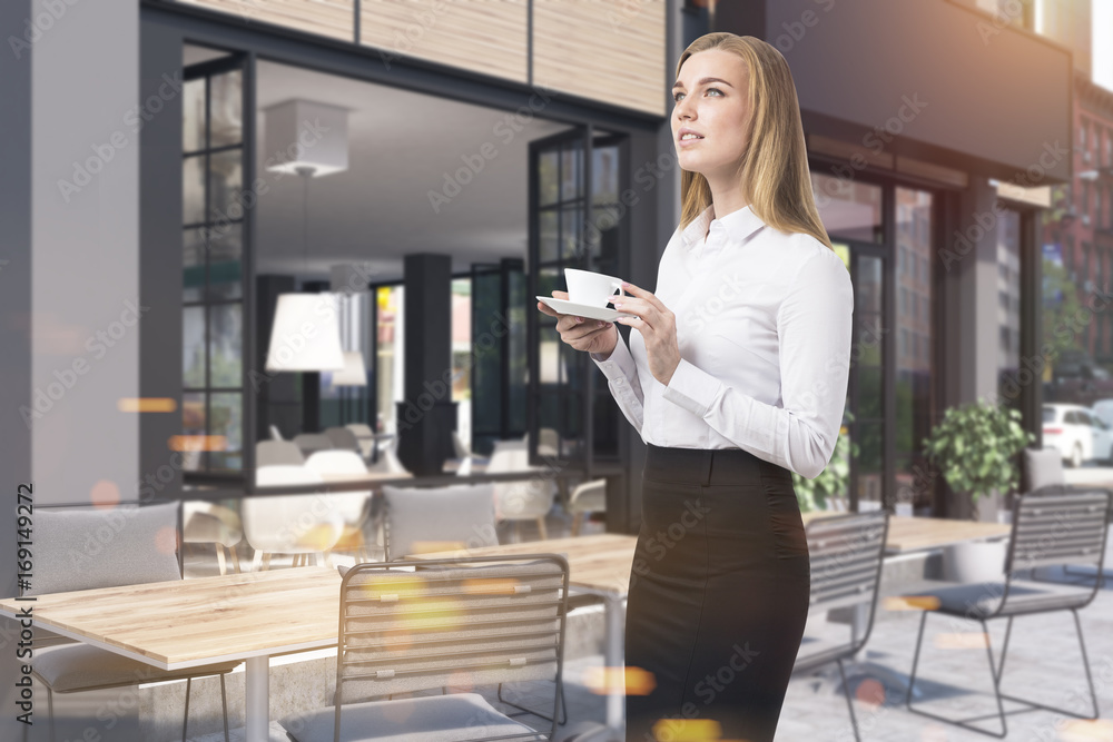 Cafe facade and tables, woman Cafe facade and tables, woman