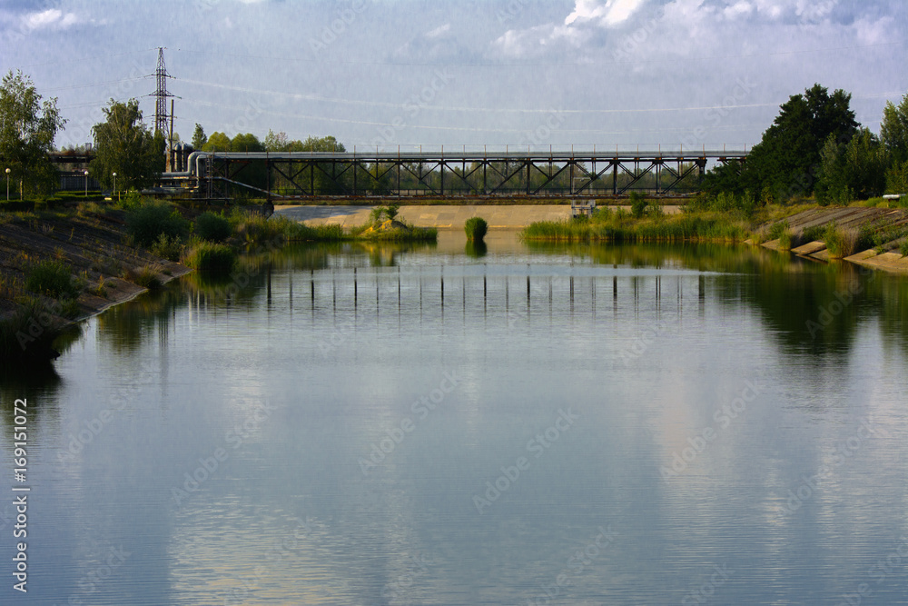 Pond chiller of the Chernobyl nuclear power plant. Dead radioactive zone. Consequences of the Chernobyl nuclear disaster, August 2017 Pond chiller of the Chernobyl nuclear power plant. Dead radioactive zone. Consequences of the Chernobyl nuclear disaster, August 2017