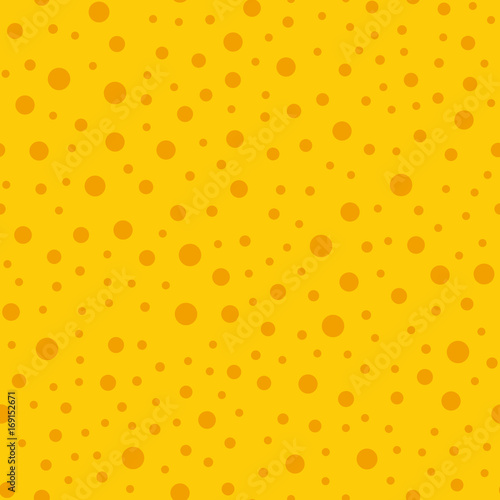 Orange polka dots seamless pattern on yellow background. Mind-blowing classic orange polka dots textile pattern in restrained colours. Seamless scattered confetti fall chaotic decor.