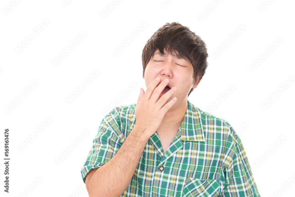 あくびをする男性 あくびをする男性