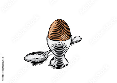 Egg in the stand for eggs and spoon