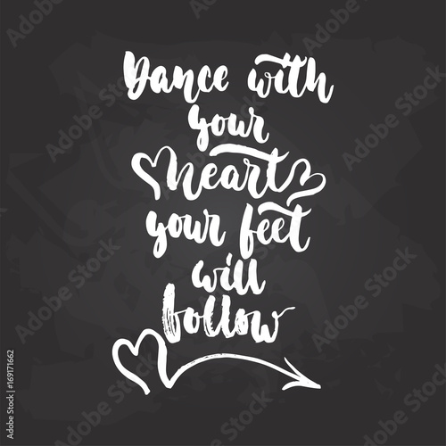 Dance with your heart your feet will follow - lettering dancing calligraphy quote drawn by ink in white color on the black chalkboard background. Fun hand drawn lettering inscription.