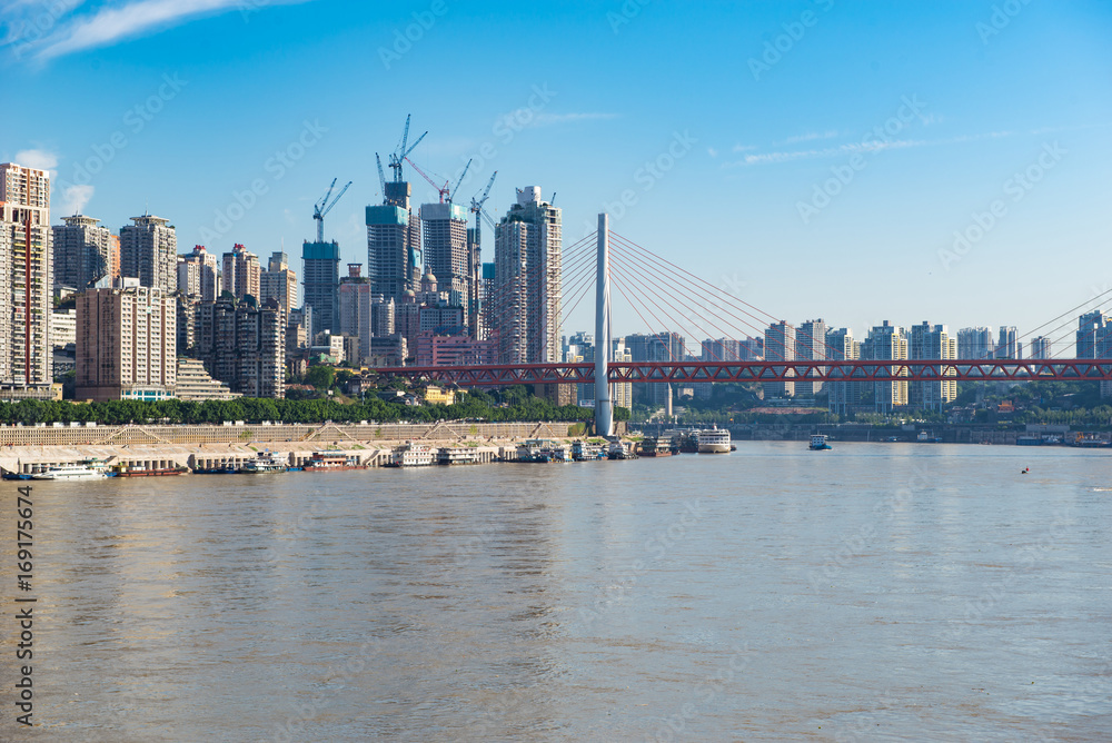 Obraz premium cityscape and skyline of downtown near water of chongqing