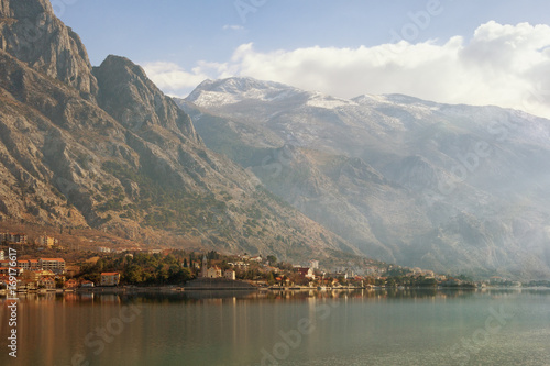 The seaside village of Dobrota with Mount Lovchen in the background. Bay of Kotor (Adriatic Sea), Montenegro