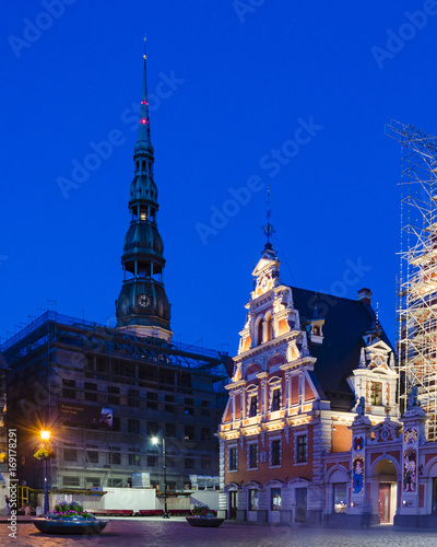 City Hall Square with House of the Blackheads and Saint Peter church in Old Town of Riga in the evening, Latvia © AlexaSokol83
