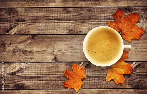 Cup of coffee with dry autu...