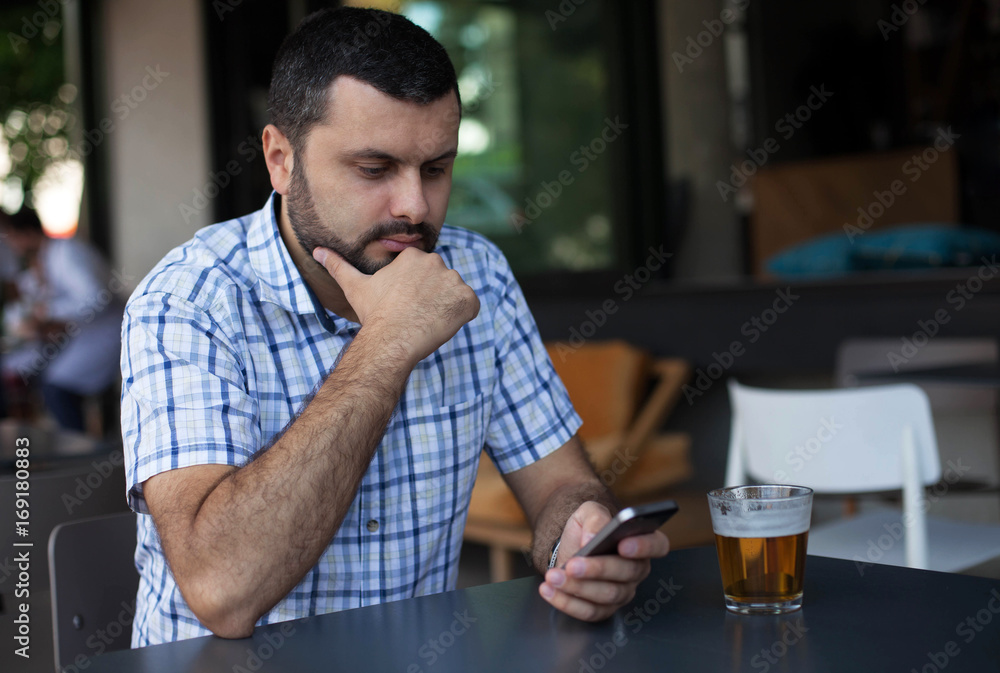 Handsome man using phone Handsome man using phone