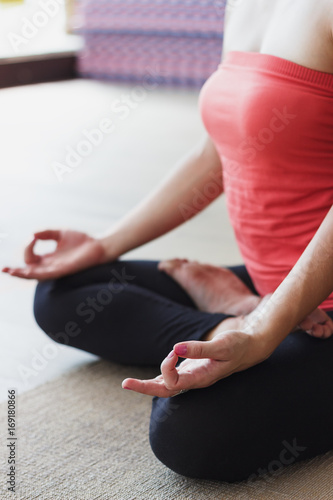 Woman makes yoga exercises