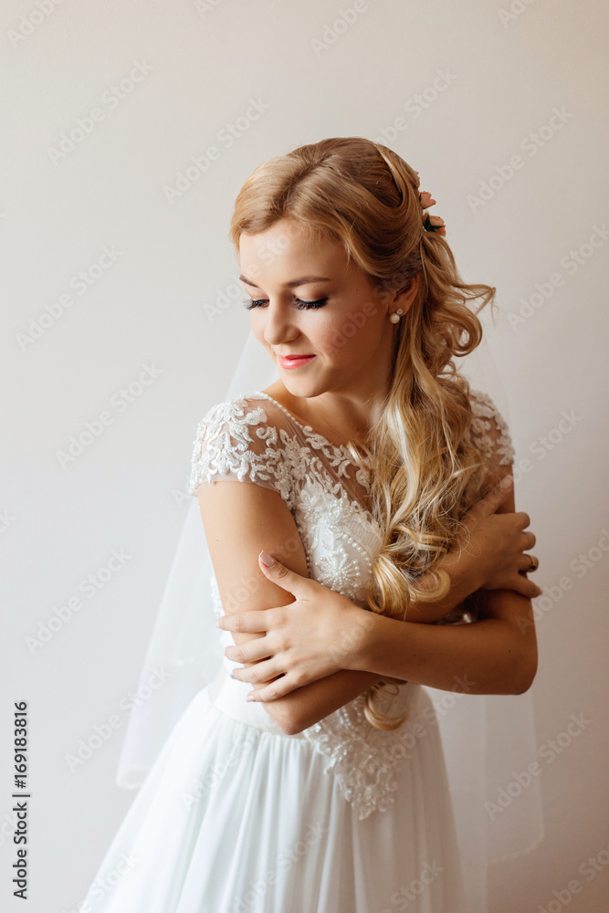 Beautiful tender bride looking down. Wedding concept. Beautiful tender bride looking down. Wedding concept.
