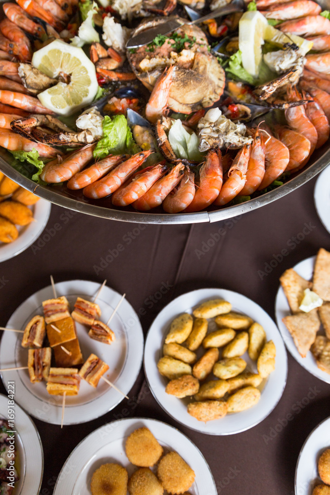 serving plate seafood and crab in big metal dish serving plate seafood and crab in big metal dish
