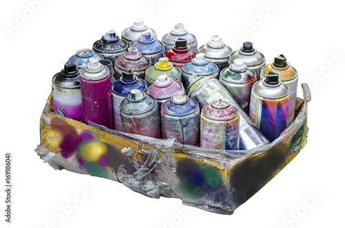 Spray cans of aerosol paint in a cardboard box