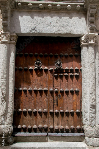 Ancient Medieval Door in Toledo, Spain photo