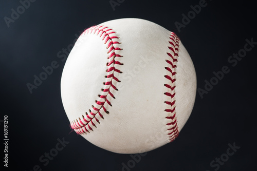 used baseball against dark shade background