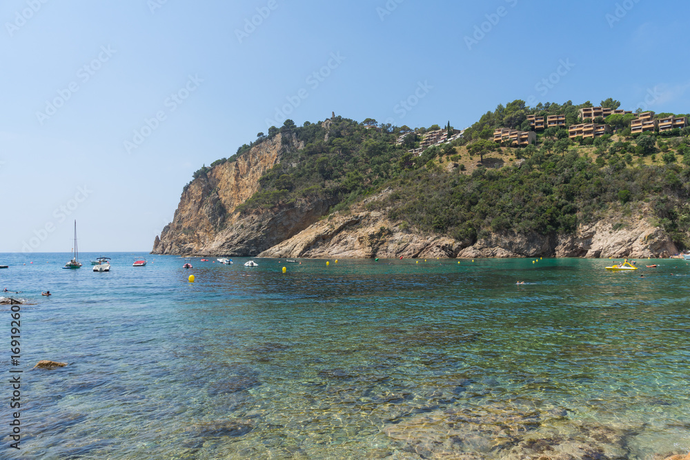 Coves of Cala Llorell beach in Tossa de Mar, Spain