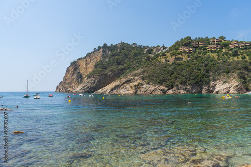 Fototapeta Naklejka Na Ścianę i Meble -  Coves of Cala Llorell beach in Tossa de Mar, Spain